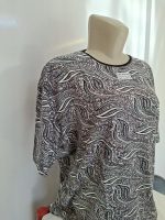 تیشرت زنانه یقه گرد طرح برگ سایز بزرگ آبرنگی - تصویر 4