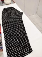 شلوار نخی(کره ای)زمینه مشکی طرح دار